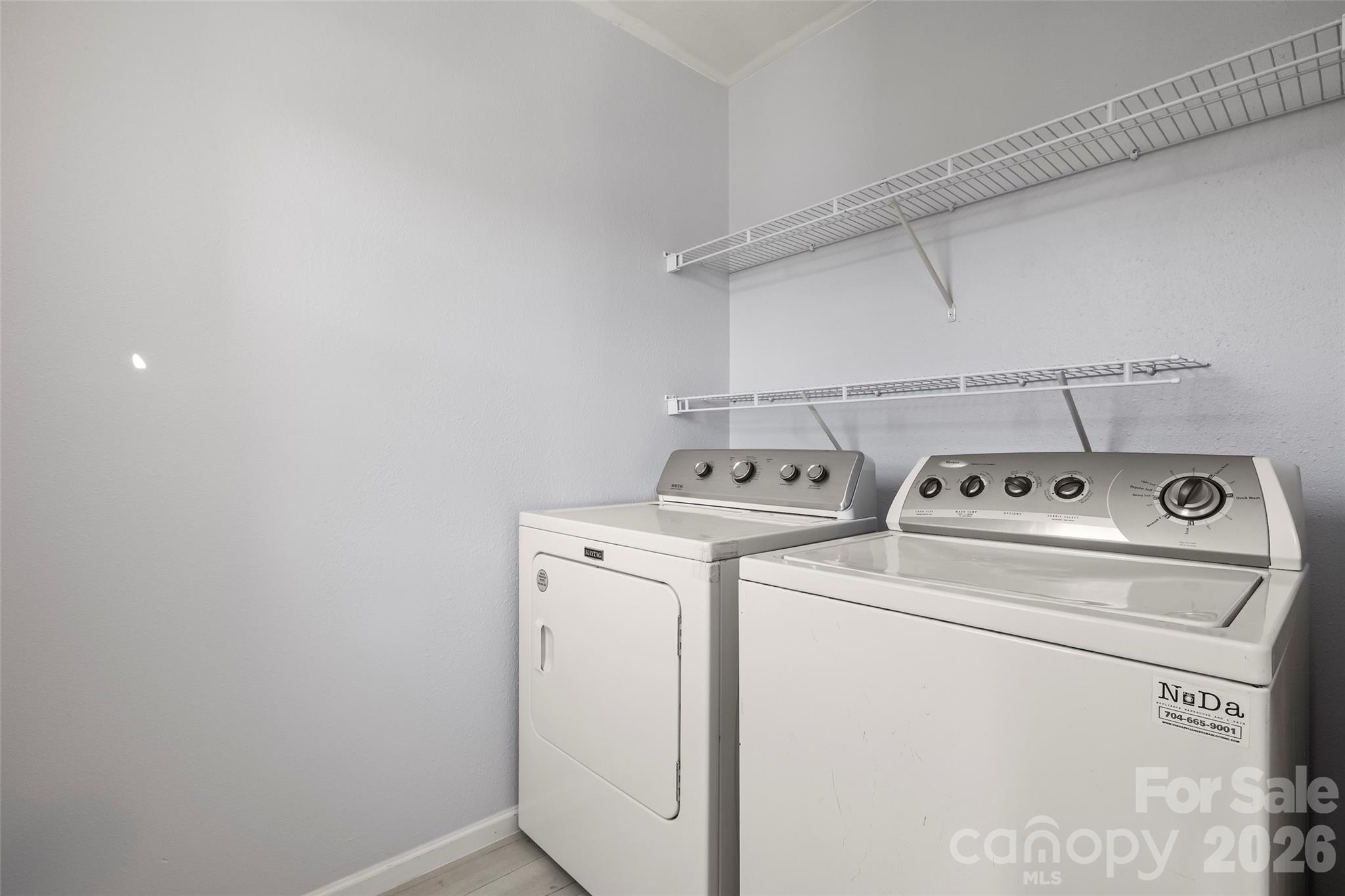 4485 Easywater Lane Fort Mill, SC 29707 - Photo 22 of 29 a view of storage and utility room with washer and dryer