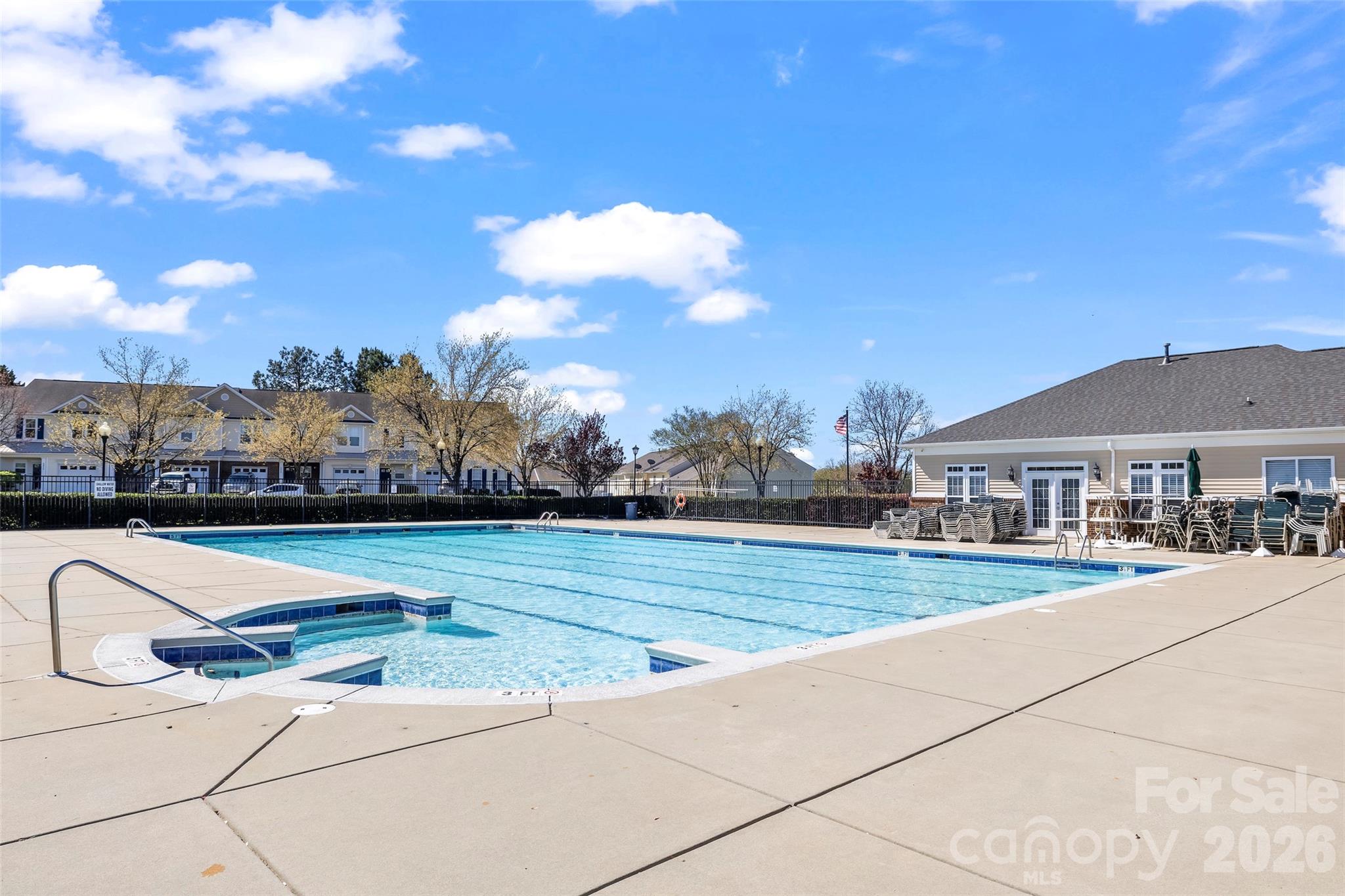 4485 Easywater Lane Fort Mill, SC 29707 - Photo 28 of 29 a view of swimming pool with outdoor seating and city view
