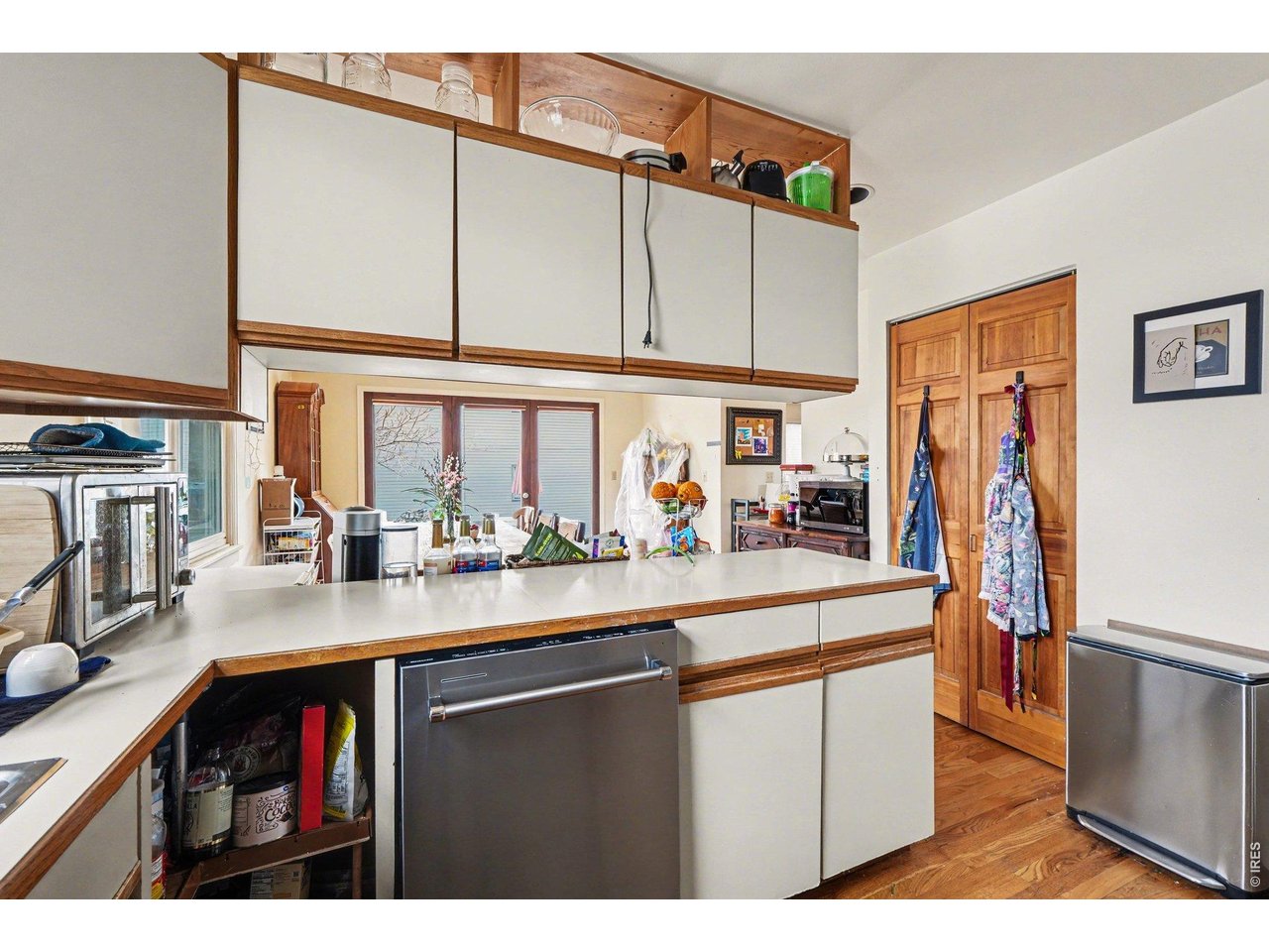 623 Marine Street Boulder, CO 80302 - Photo 14 of 38 a kitchen with stainless steel appliances granite countertop a sink and cabinets