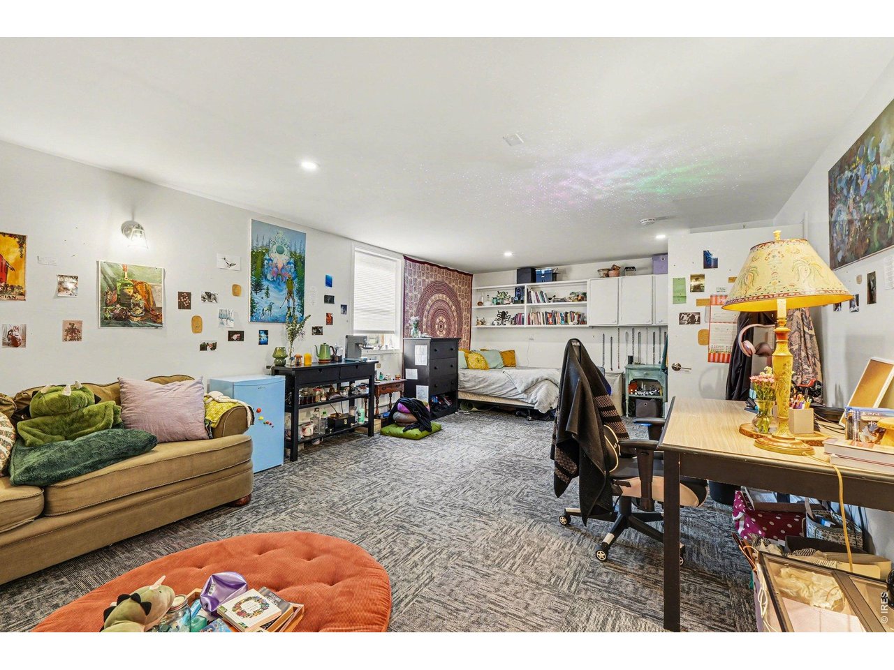623 Marine Street Boulder, CO 80302 - Photo 27 of 38 a living room with furniture and a dining table