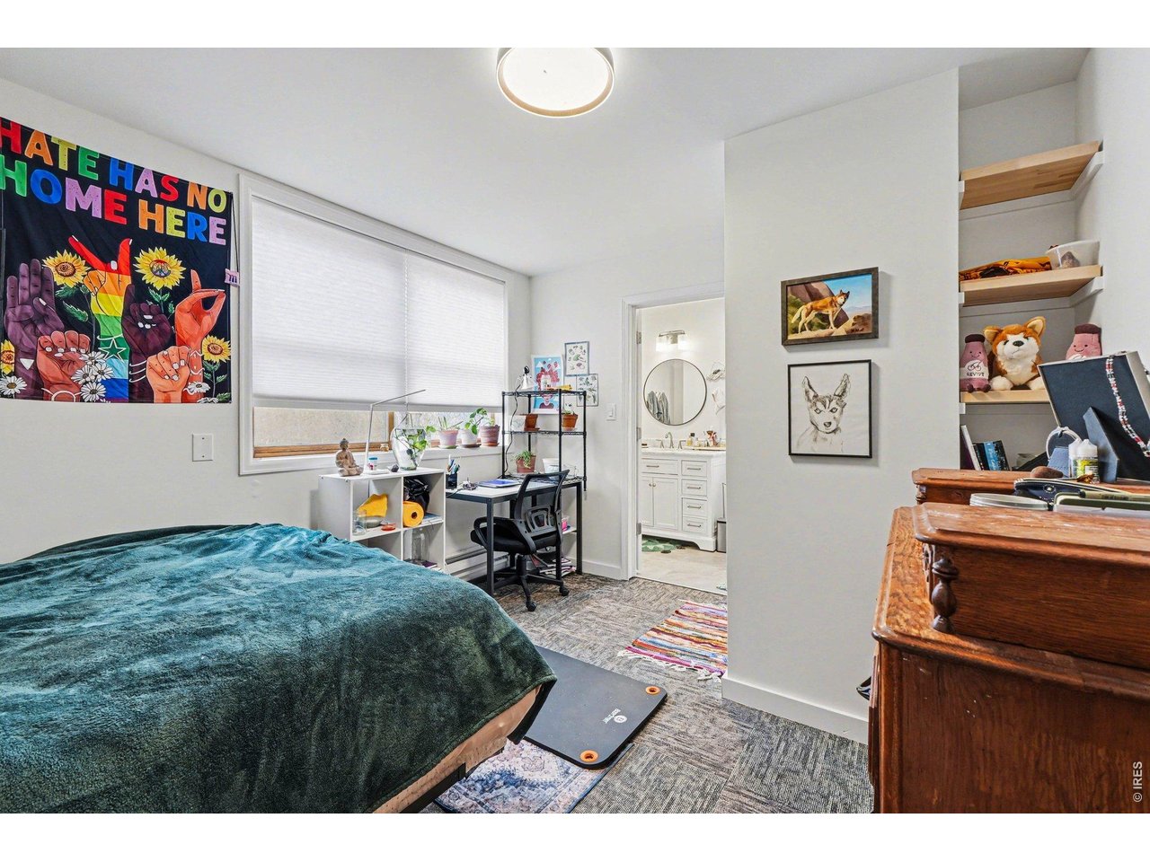 623 Marine Street Boulder, CO 80302 - Photo 28 of 38 a bed room with a bed and a television