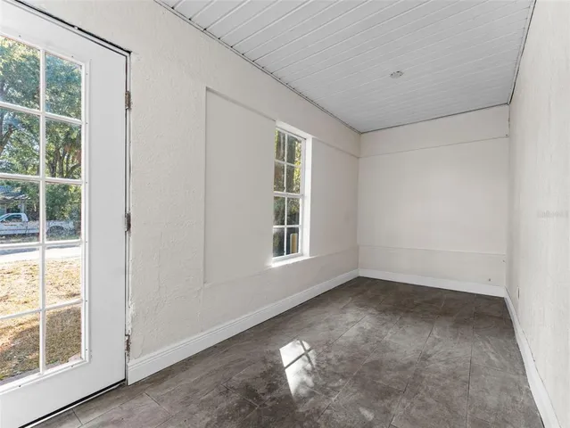 an empty room with windows