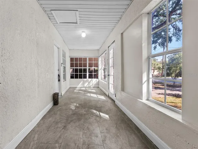 a view of an empty room and window
