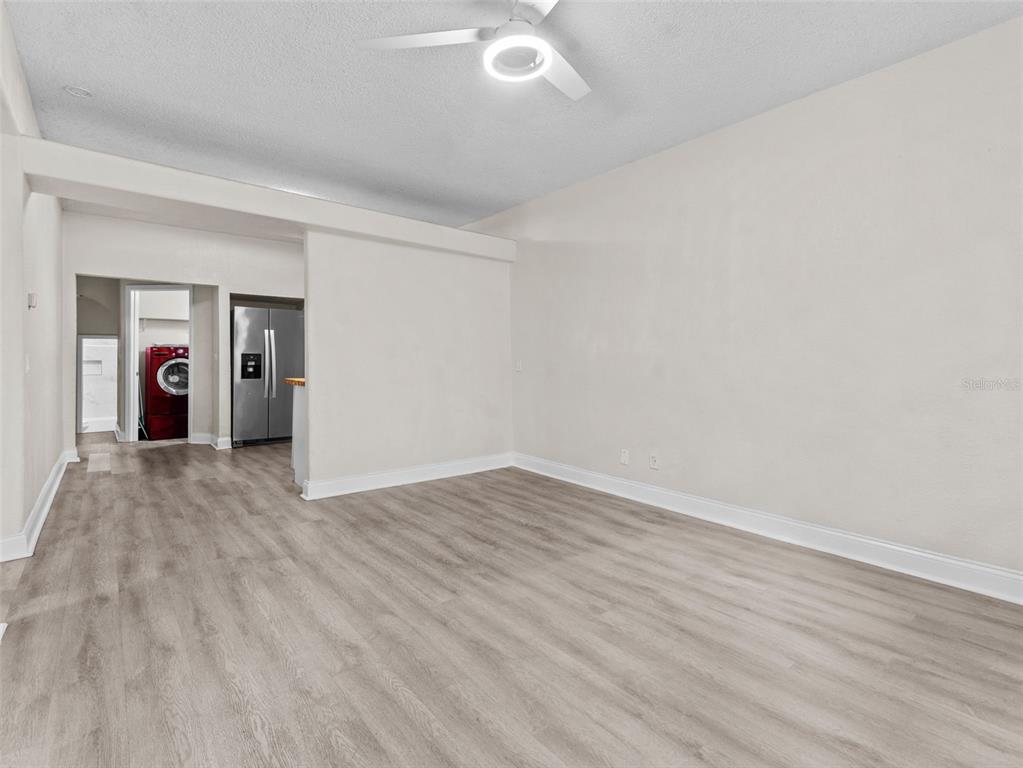 8210 North Klondyke Street, Unit 1 Tampa, FL 33604 - Photo 5 of 34 wooden floor in an empty room