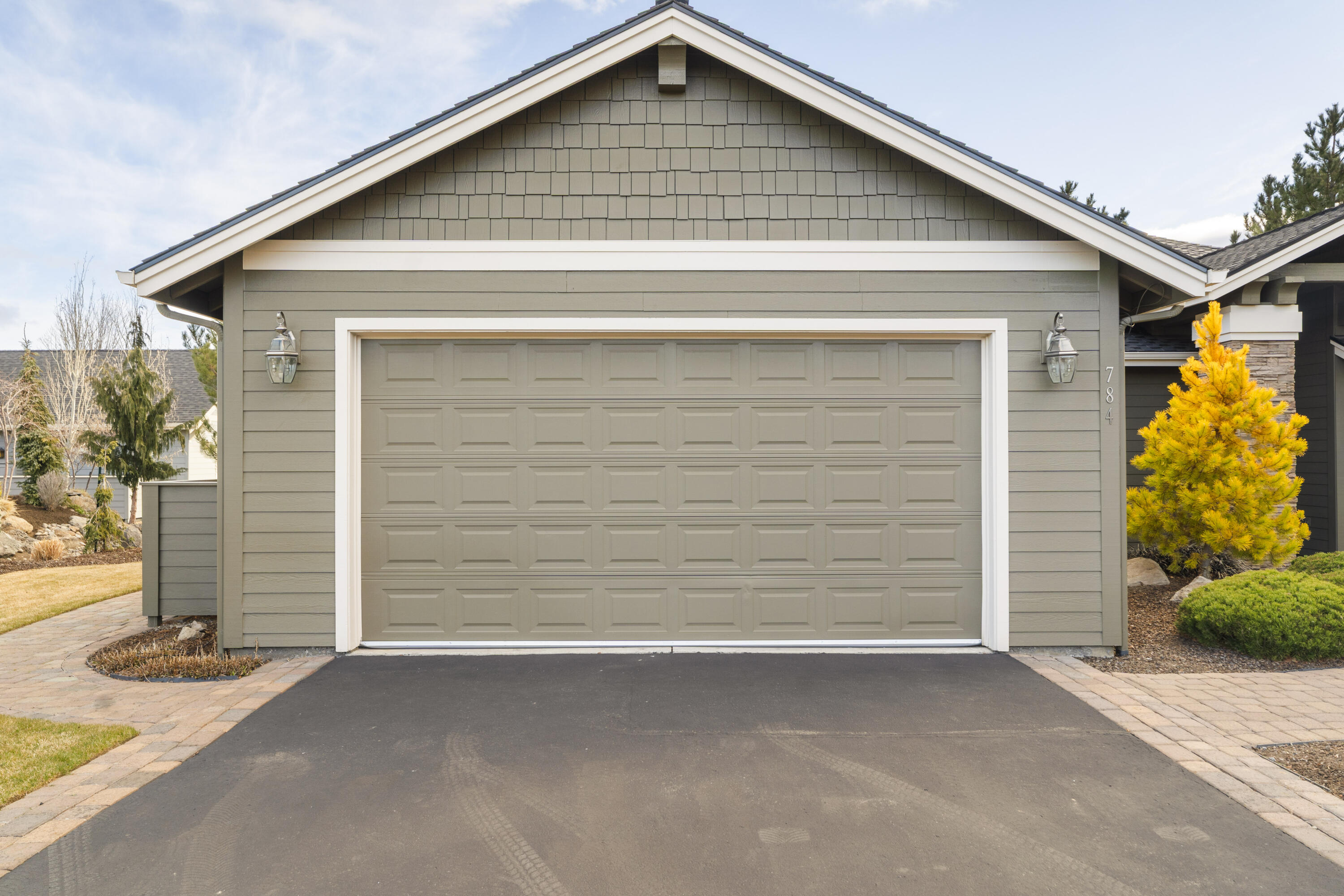784 Ribbon Falls Road Redmond, OR 97756 - Photo 3 of 79 a view of a house with garage