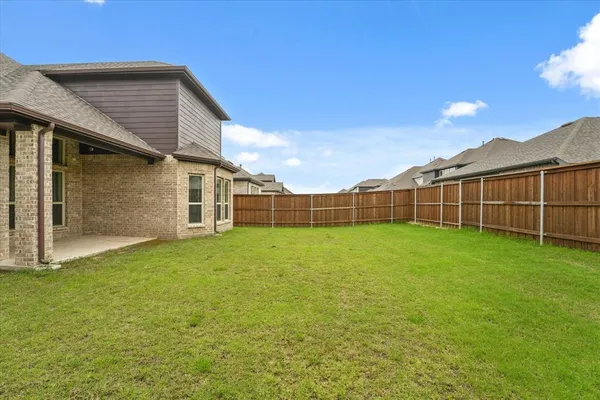 a view of a backyard with a garden