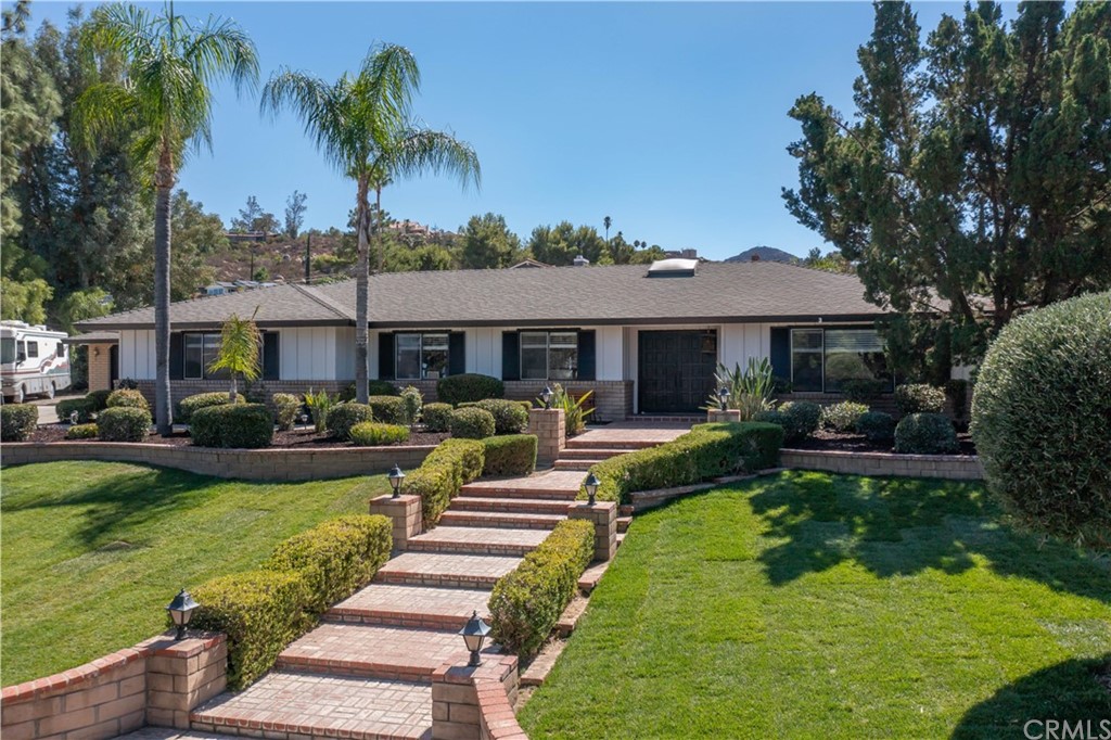 28129 Rawlings Road Hemet, CA 92544 - Photo 1 of 1 a front view of a house with yard patio and swimming pool