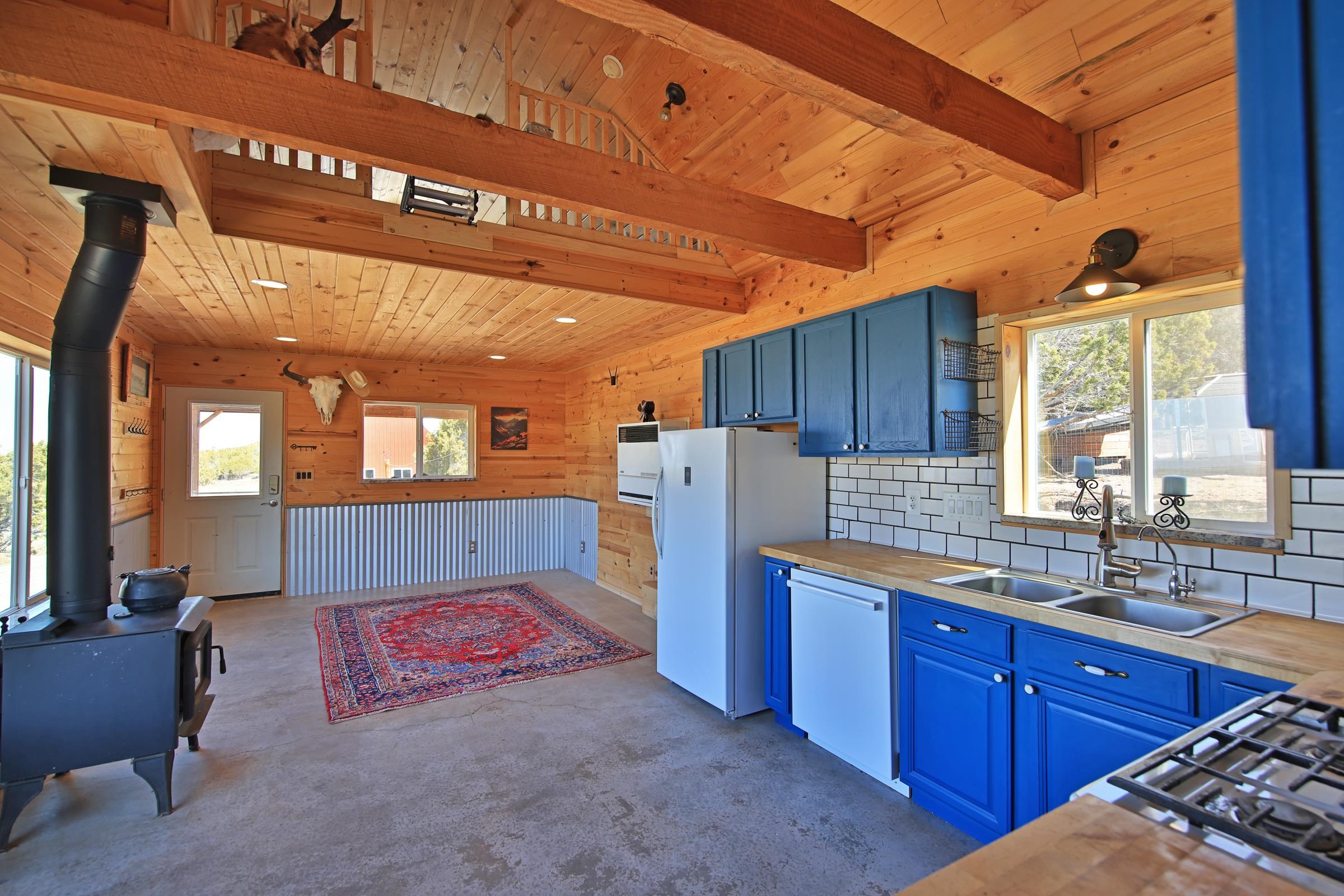 56001 KK Road Molina, CO 81646 - Photo 12 of 42 a kitchen with refrigerator and window