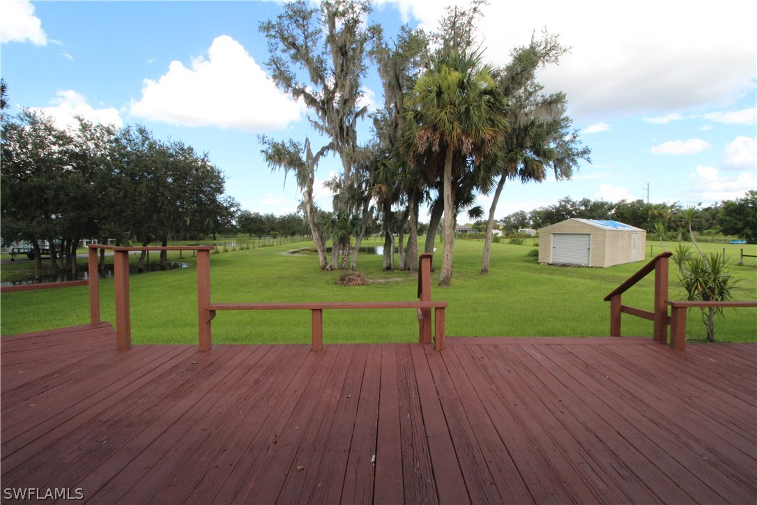 2771 Packinghouse Road Alva, FL 33920 - Photo 17 of 35 a view of park with an empty space and slide