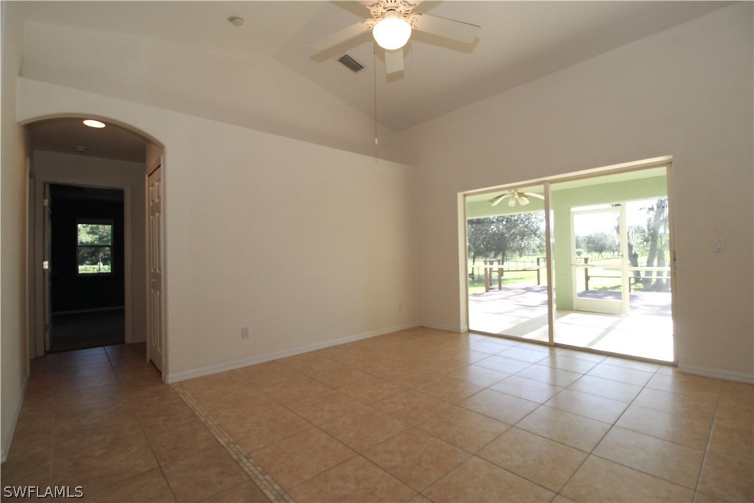 2771 Packinghouse Road Alva, FL 33920 - Photo 21 of 35 a view of an empty room with a window