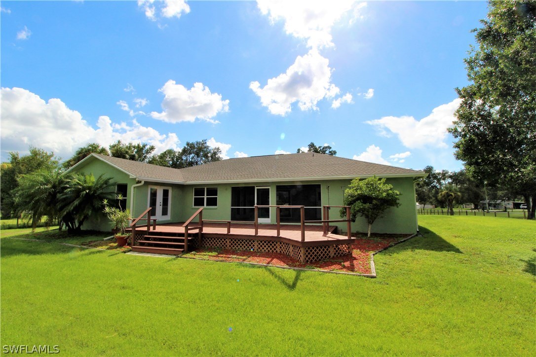 2771 Packinghouse Road Alva, FL 33920 - Photo 7 of 35 a view of a house with swimming pool and porch