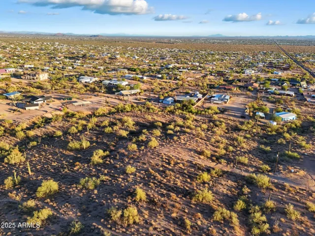 an aerial view of residential building with parking space