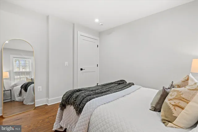 a picture of a bench in front of a door