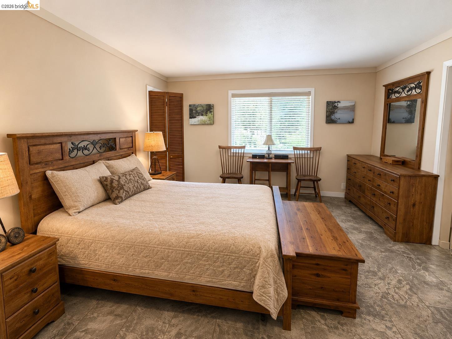 18195 Wards Ferry Road Sonora, CA 95370 - Photo 19 of 67 Spacious room featuring neutral-toned walls, crown molding, and a wide window with blinds