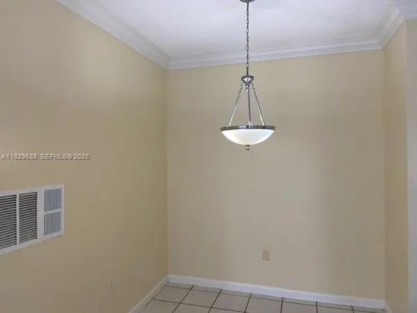 a view of a room with a chandelier