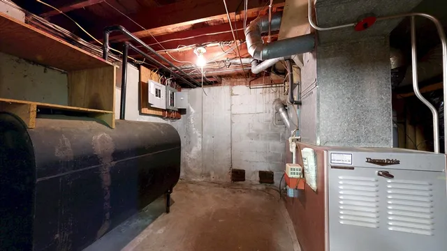 a view of balcony with two chairs and door
