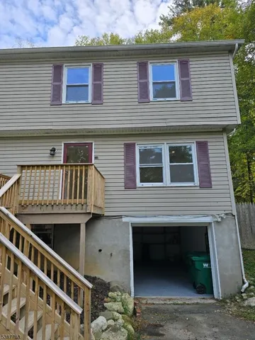 a front view of a house with balcony