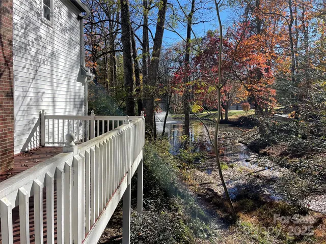 a view of backyard with green space