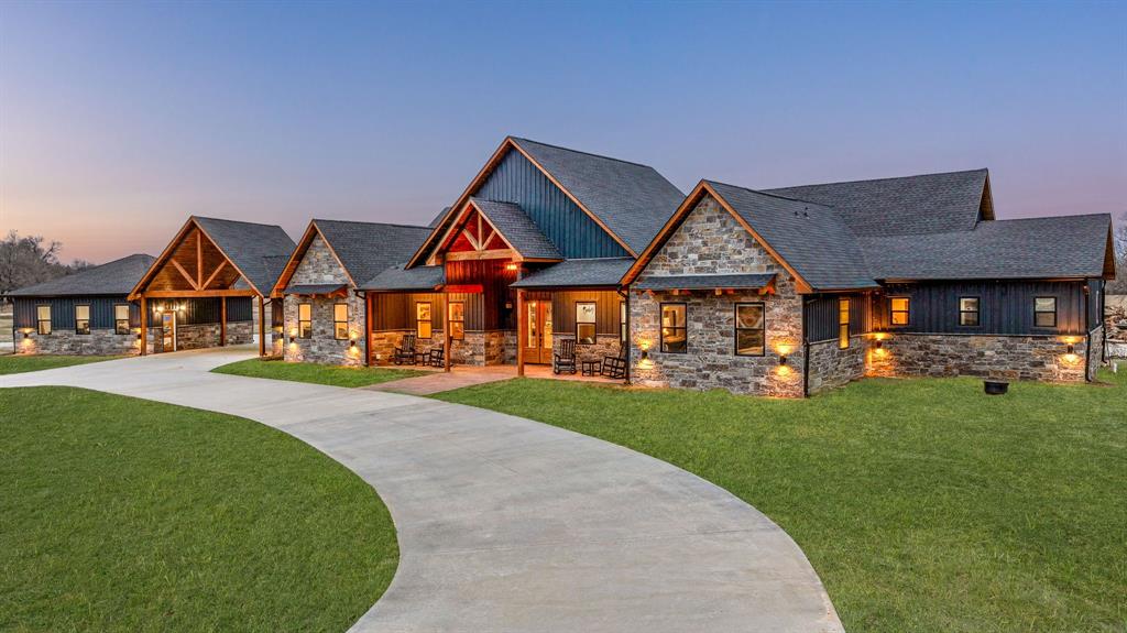 239 32507th Road Paris, TX 75460 - Photo 4 of 40 Craftsman inspired home with stone siding, a front yard, and a porch