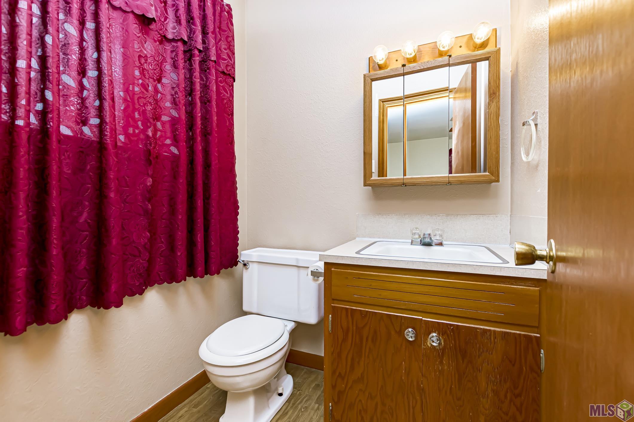 8925 Syble Drive Baton Rouge, LA 70814 - Photo 15 of 23 Primary Bedroom has an Ensuite half bath
