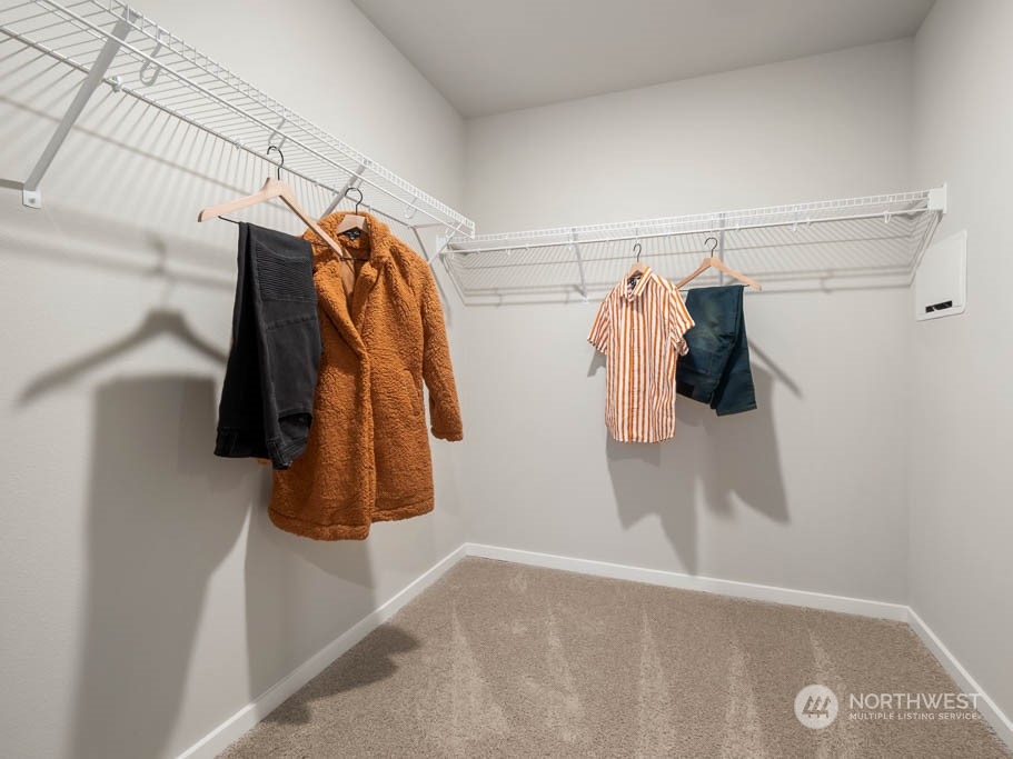4229 Pronghorn Place, Unit 20 Bremerton, WA 98310 - Photo 17 of 21 a view of walk in closet with clothes and shoes