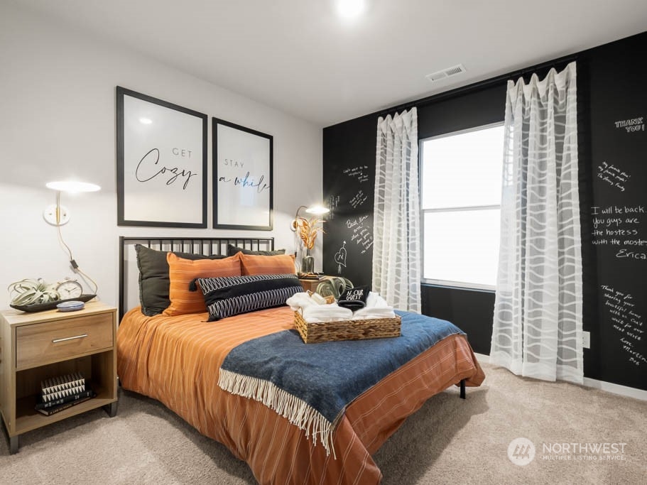 4229 Pronghorn Place, Unit 20 Bremerton, WA 98310 - Photo 19 of 21 a bedroom with a bed and a window