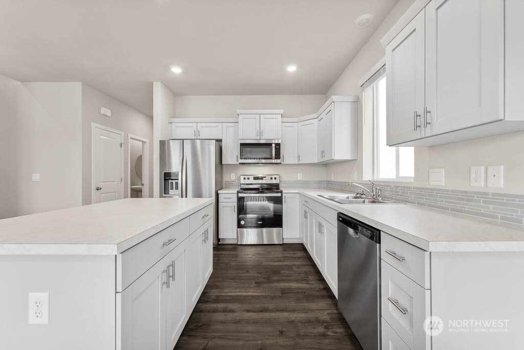 4229 Pronghorn Place, Unit 20 Bremerton, WA 98310 - Photo 5 of 21 a large kitchen with a stove top oven
