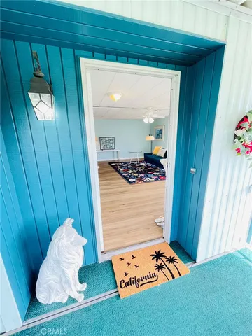 a room with window and furniture