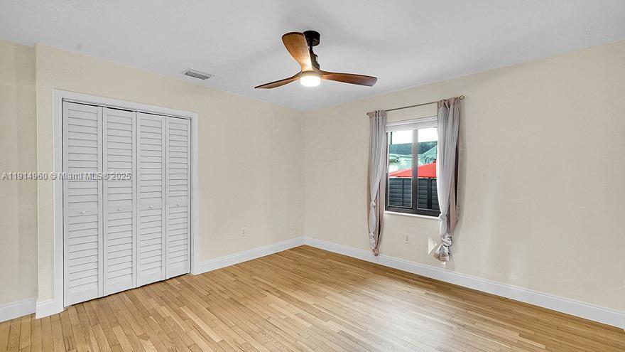 3764 Southwest 27th Lane, Unit 3762 Miami, FL 33134 - Photo 18 of 31 a view of empty room with wooden floor
