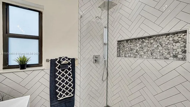 a bathroom with a sink a mirror and a window