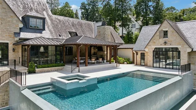a bathroom with a tub and a sink