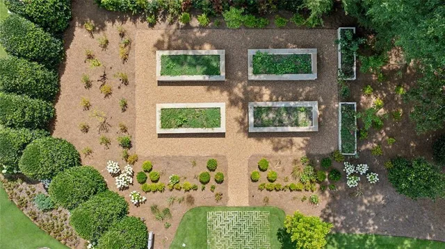 a view of a dining room with furniture wooden floor and chandelier