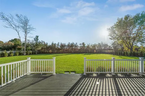 a kitchen with a sink stove and refrigerator