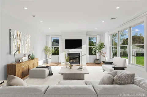 a kitchen with stainless steel appliances granite countertop a lot of counter space and wooden floor