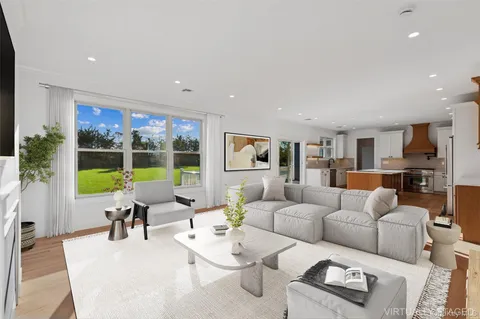 a view of a hallway with seating area