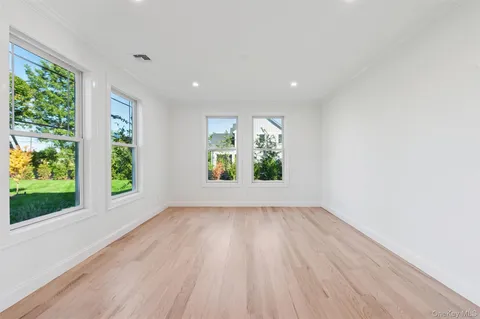 a bathroom with a shower and sink