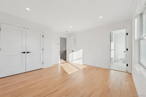 a view of a hallway with closet