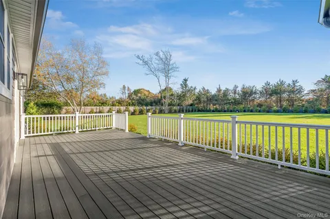 a view of a kitchen with a sink and a stove top oven