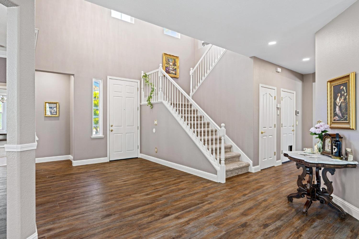 426 South Highland Avenue Ripon, CA 95366 - Photo 48 of 82 a view of an entryway with wooden floor and stairs