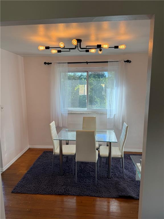 662 Lindsay Road Carnegie, PA 15106 - Photo 8 of 19 a dining room with furniture and wooden floor