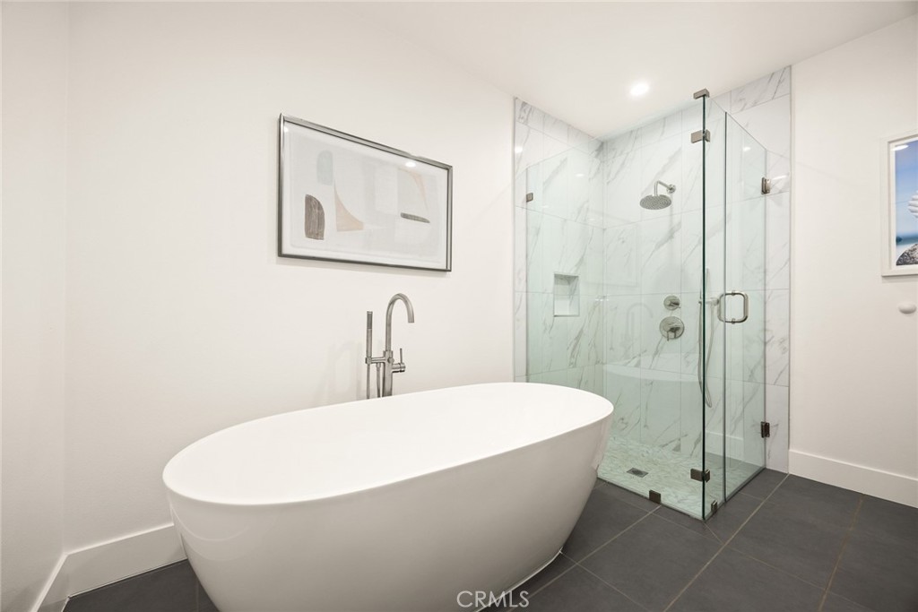 905 Sunset Boulevard, Unit A Arcadia, CA 91007 - Photo 19 of 35 a white bath tub sitting next to a bathroom sink