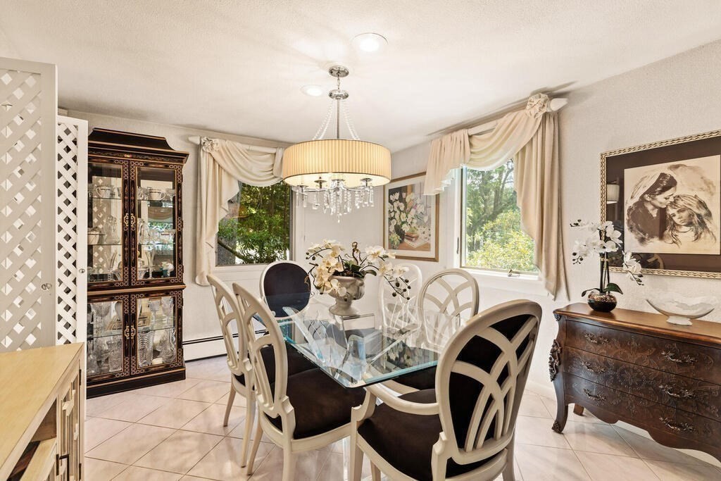 124 Damon Road Needham, MA 02494 - Photo 11 of 42 a view of a dining room with furniture window and outside view