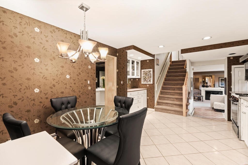 124 Damon Road Needham, MA 02494 - Photo 12 of 42 a dinning room with furniture and wooden floor