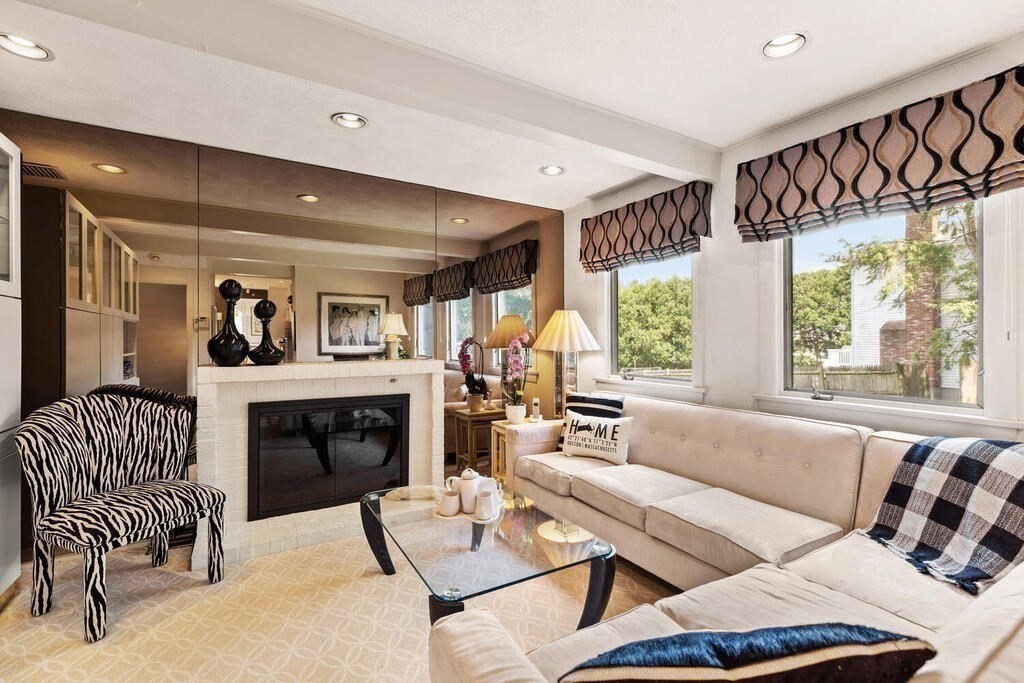 124 Damon Road Needham, MA 02494 - Photo 17 of 42 a living room with furniture and a fireplace