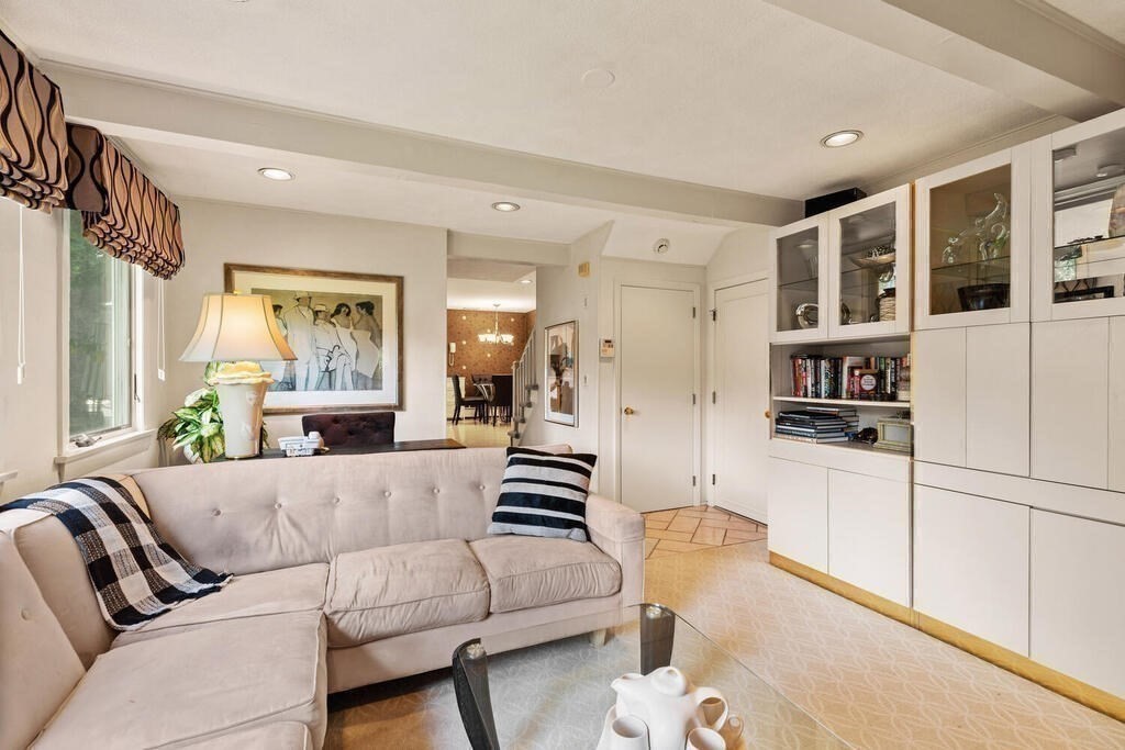 124 Damon Road Needham, MA 02494 - Photo 18 of 42 a living room with furniture and a large window