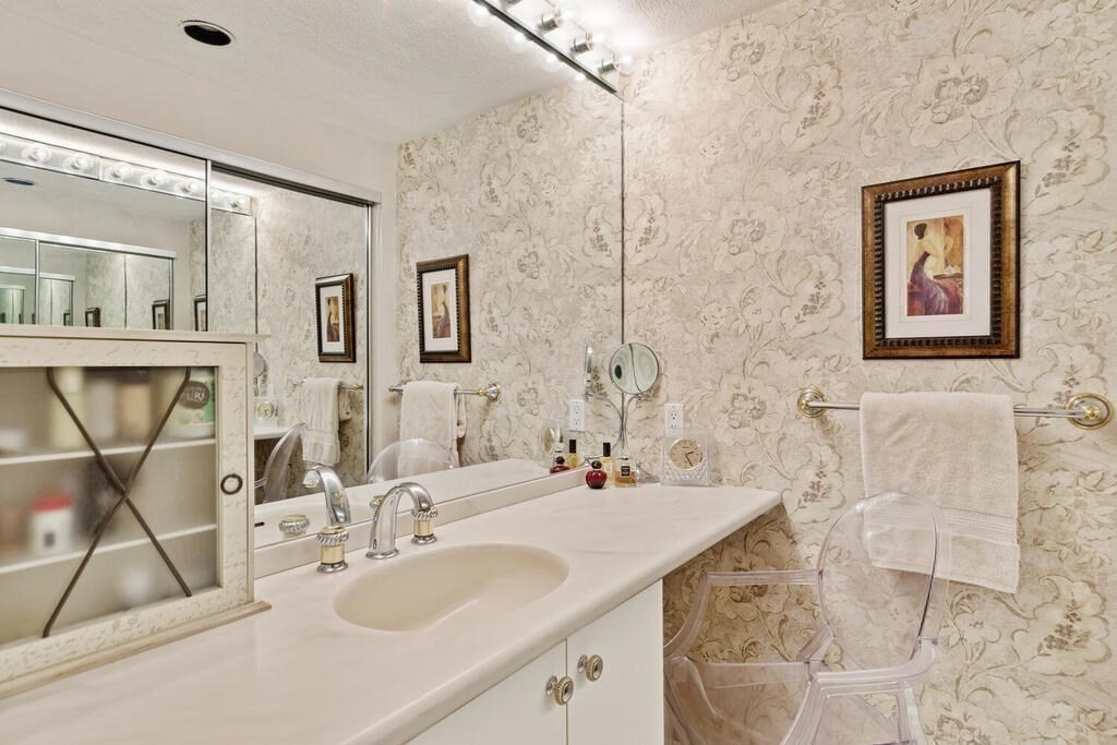 124 Damon Road Needham, MA 02494 - Photo 25 of 42 a bathroom with a sink and a mirror