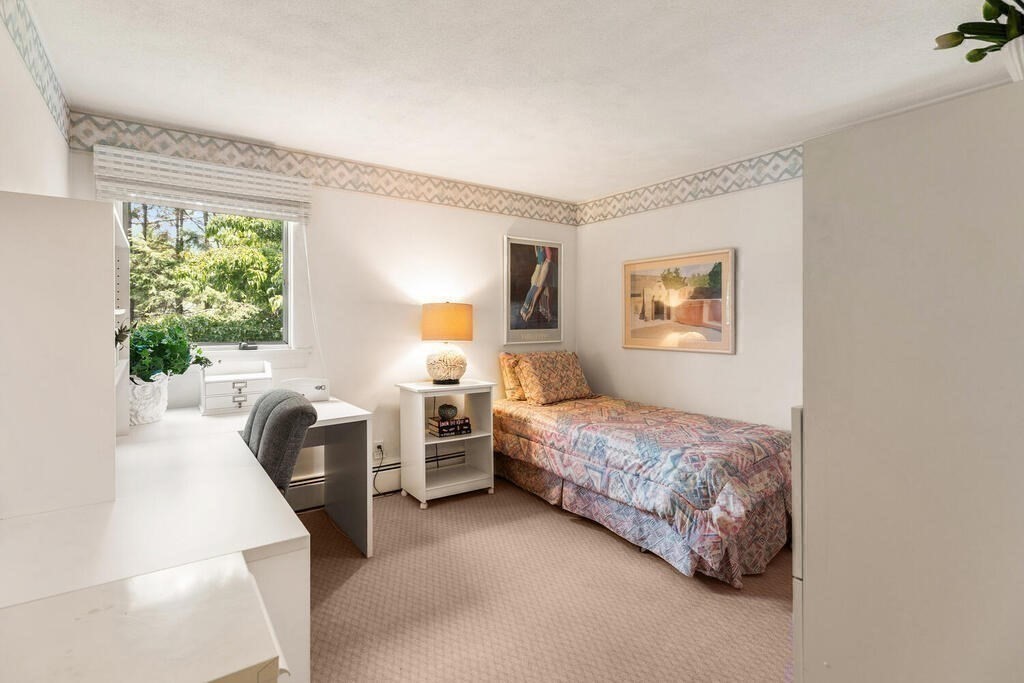 124 Damon Road Needham, MA 02494 - Photo 26 of 42 a bedroom with a bed and a couch