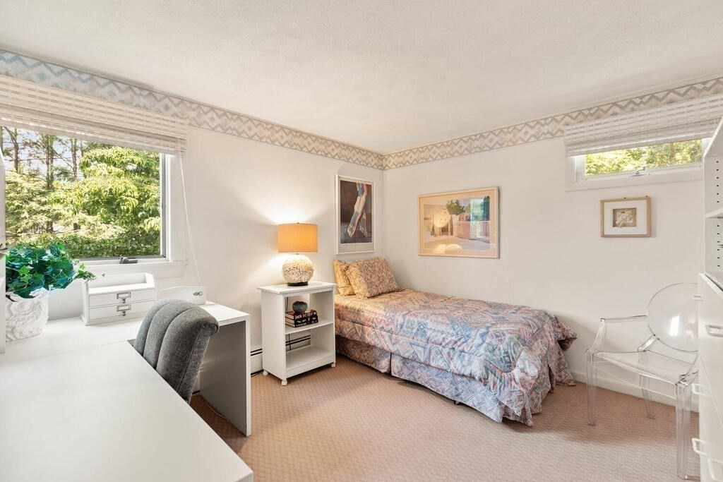 124 Damon Road Needham, MA 02494 - Photo 27 of 42 a bedroom with a bed and a couch