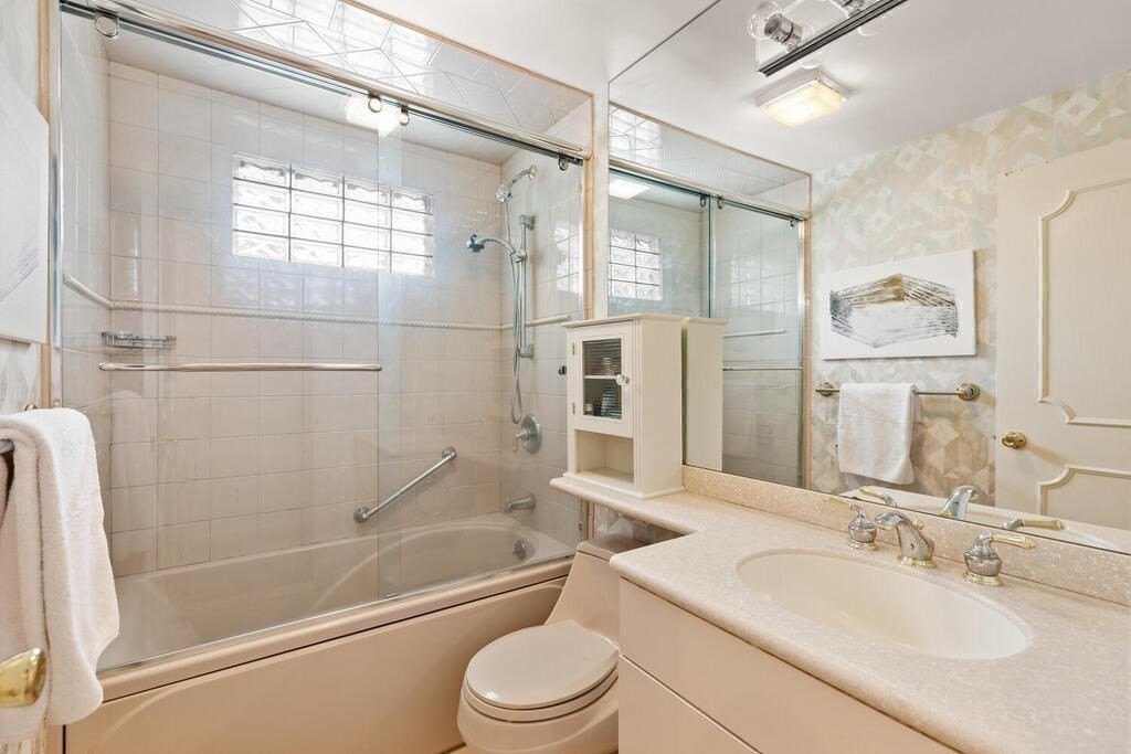 124 Damon Road Needham, MA 02494 - Photo 28 of 42 a bathroom with a sink a toilet and shower