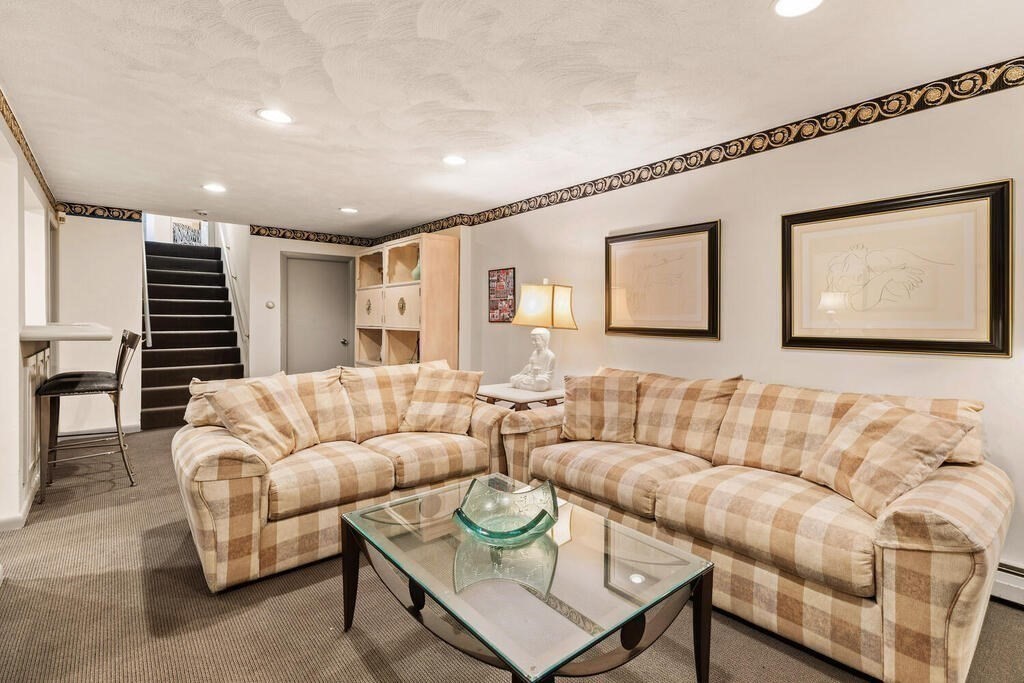 124 Damon Road Needham, MA 02494 - Photo 32 of 42 a living room with furniture and a large window